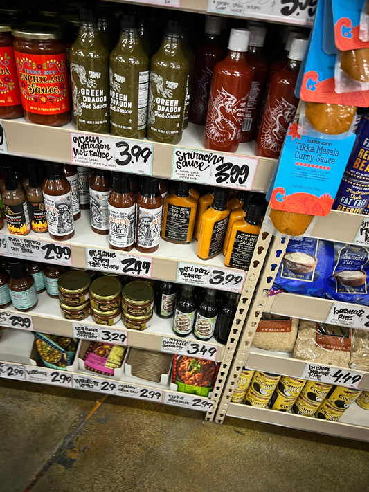 Trader Joe's viral must-have products Everything But the Bagel seasoning Crunchy Chili Onion Cocoa Almond Spread