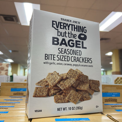 Angled front view of Trader Joe's Everything but the Bagel Seasoned Bite Sized Crackers 10 oz