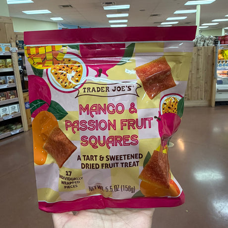 Two bags of Trader Joe's Mango & Passion Fruit Squares displayed on store shelf