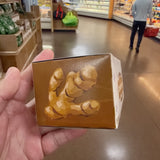 Side of Trader Joe's Ginger Lemon Herbal Tea box with ginger illustration.