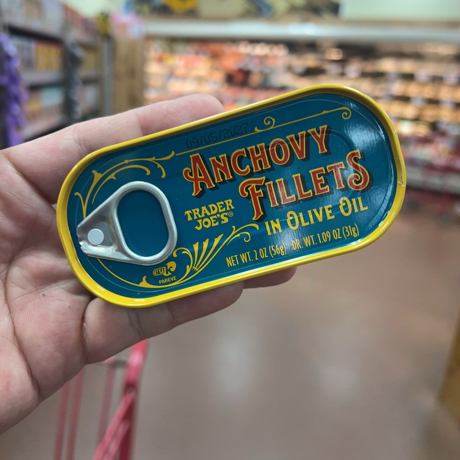 Trader Joe's Anchovy Fillets in Olive Oil tin angled view