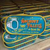 Trader Joe's Anchovy Fillets in Olive Oil tins on store shelf