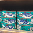 Trader Joe's Chunk Light Skipjack Tuna cans on store shelf