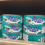 Trader Joe's Chunk Light Skipjack Tuna cans on store shelf