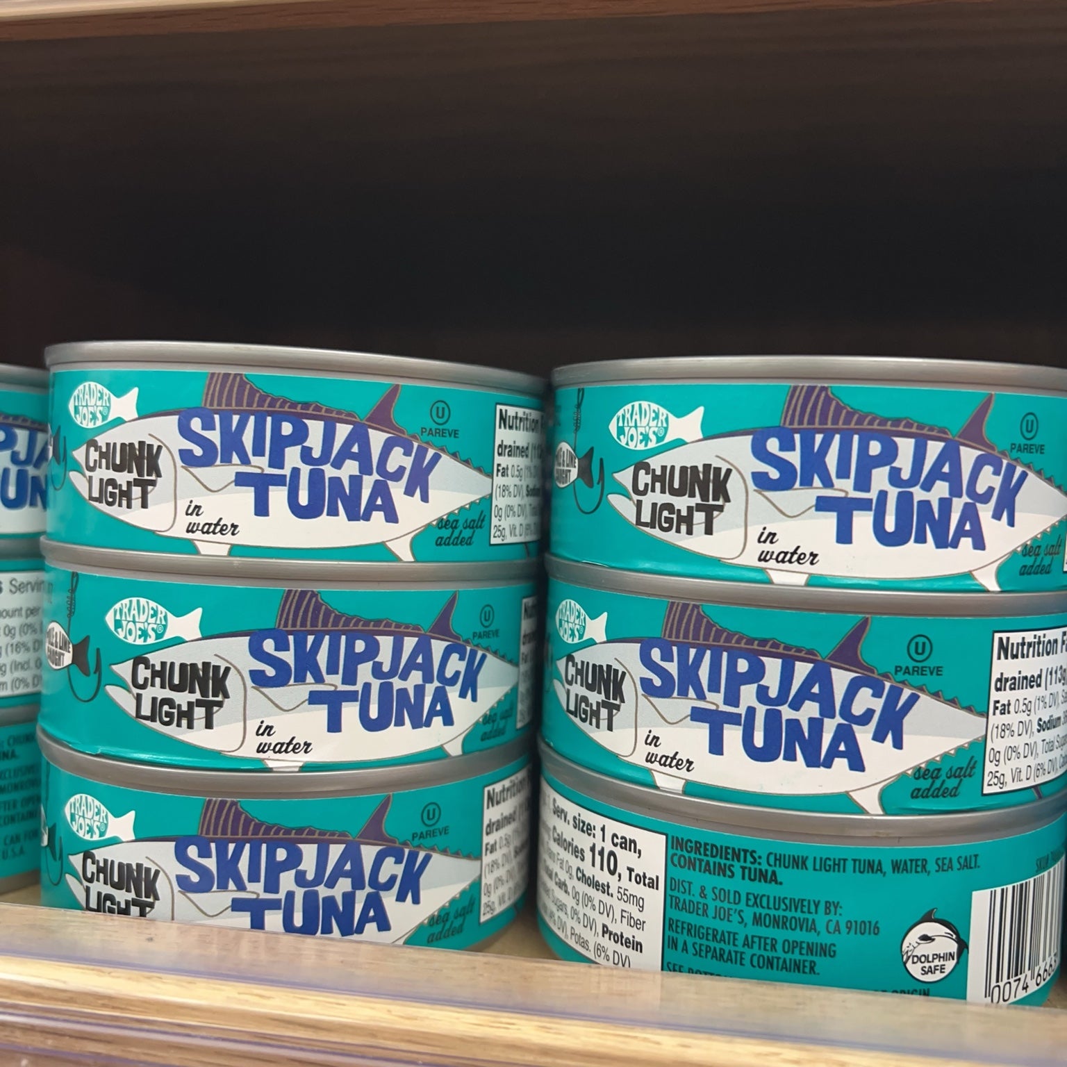 Trader Joe's Chunk Light Skipjack Tuna cans on store shelf