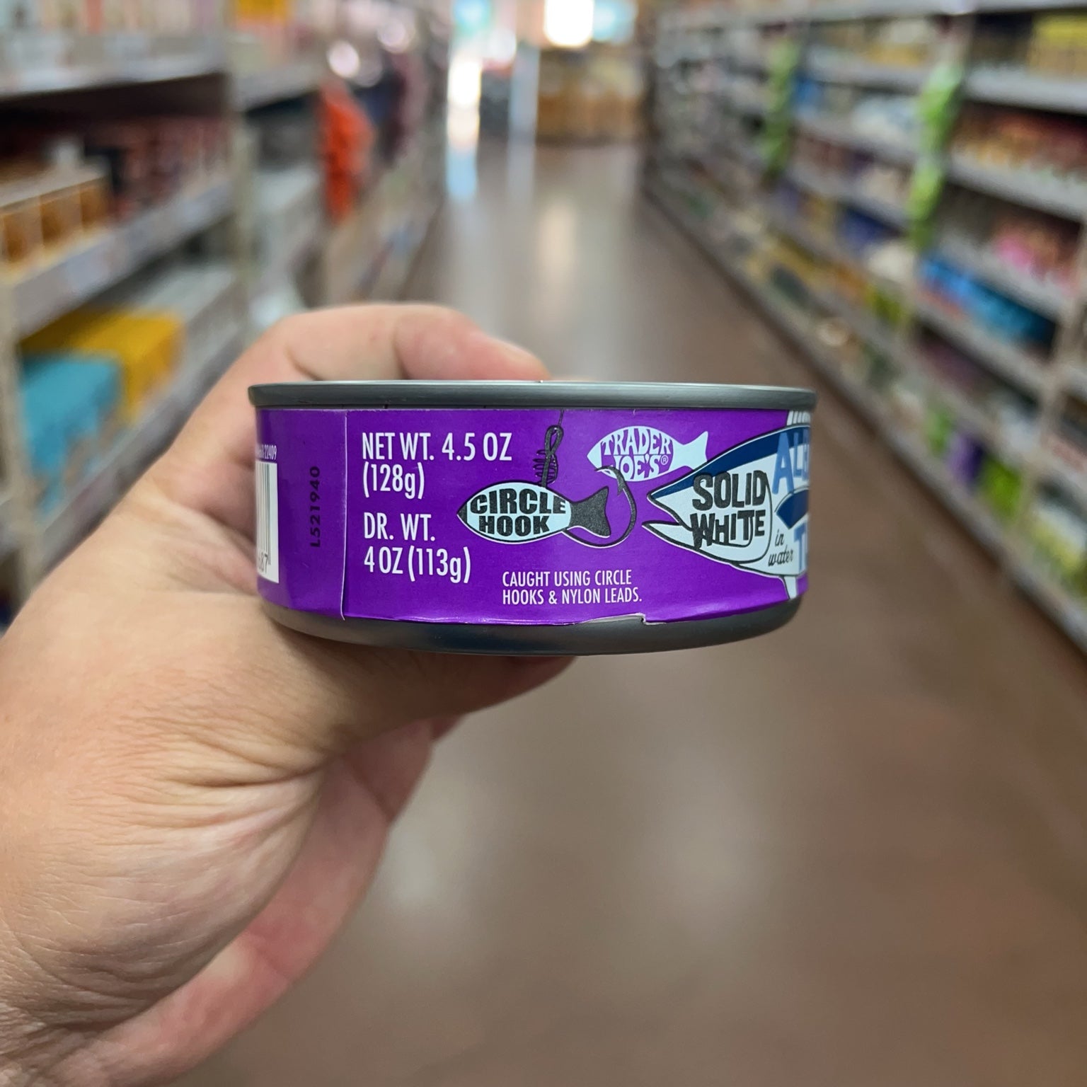 Trader Joe's Solid White Albacore Tuna in Water showing net weight 4.5 oz and drained weight 4 oz