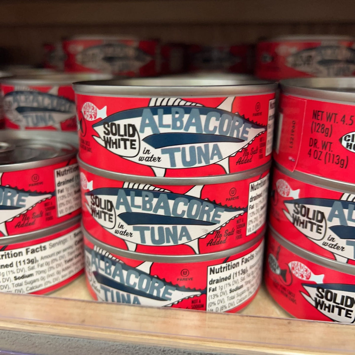 Trader Joe's Solid White Albacore Tuna in Water No Salt Added cans on store shelf