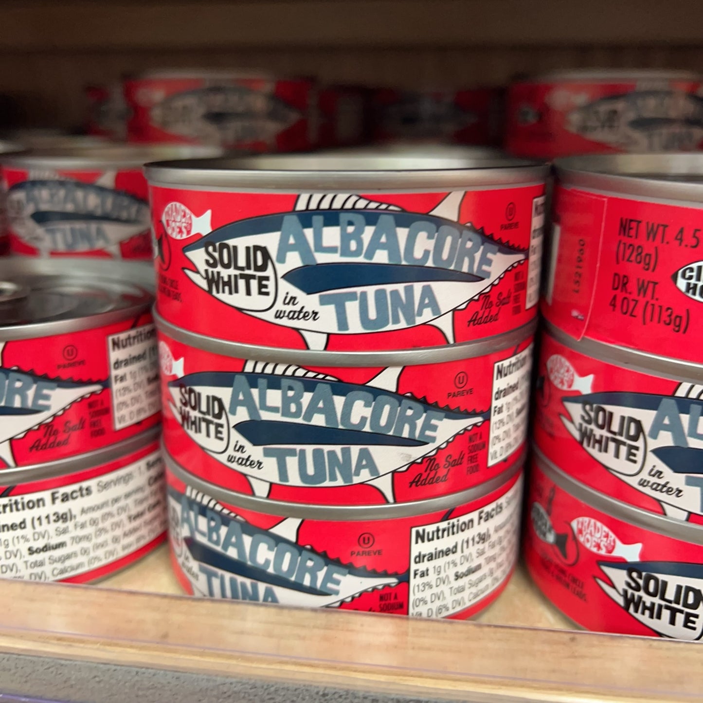 Trader Joe's Solid White Albacore Tuna in Water No Salt Added cans on store shelf