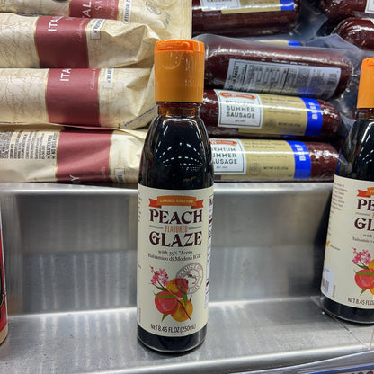 Trader Joe's Peach Flavored Glaze 8.45 fl oz bottle on store shelf