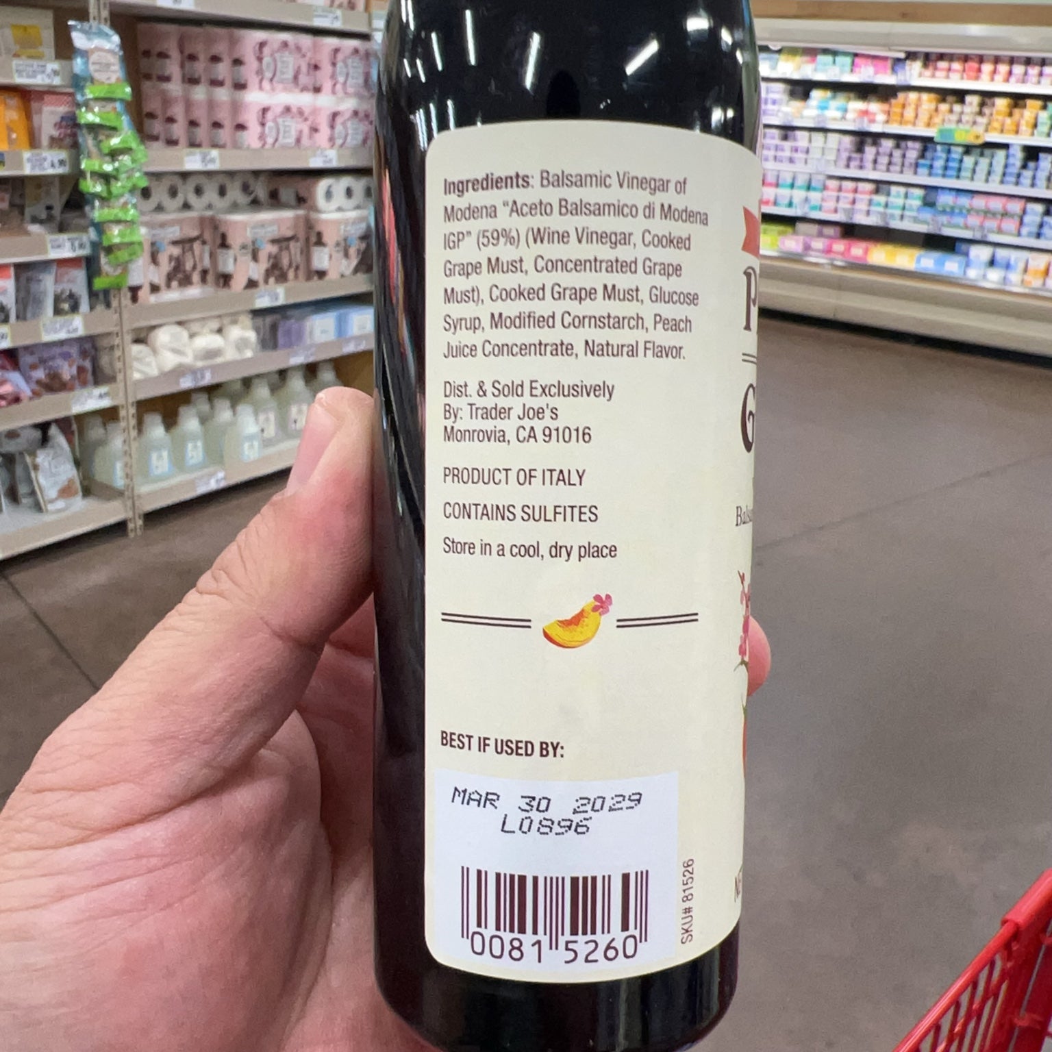 Trader Joe's Peach Flavored Glaze close-up of ingredients, sulfite allergen statement and barcode