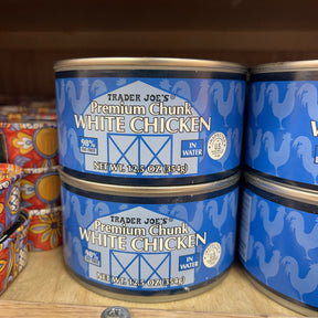 Trader Joe's Premium Chunk White Chicken 12.5 oz cans on store shelf