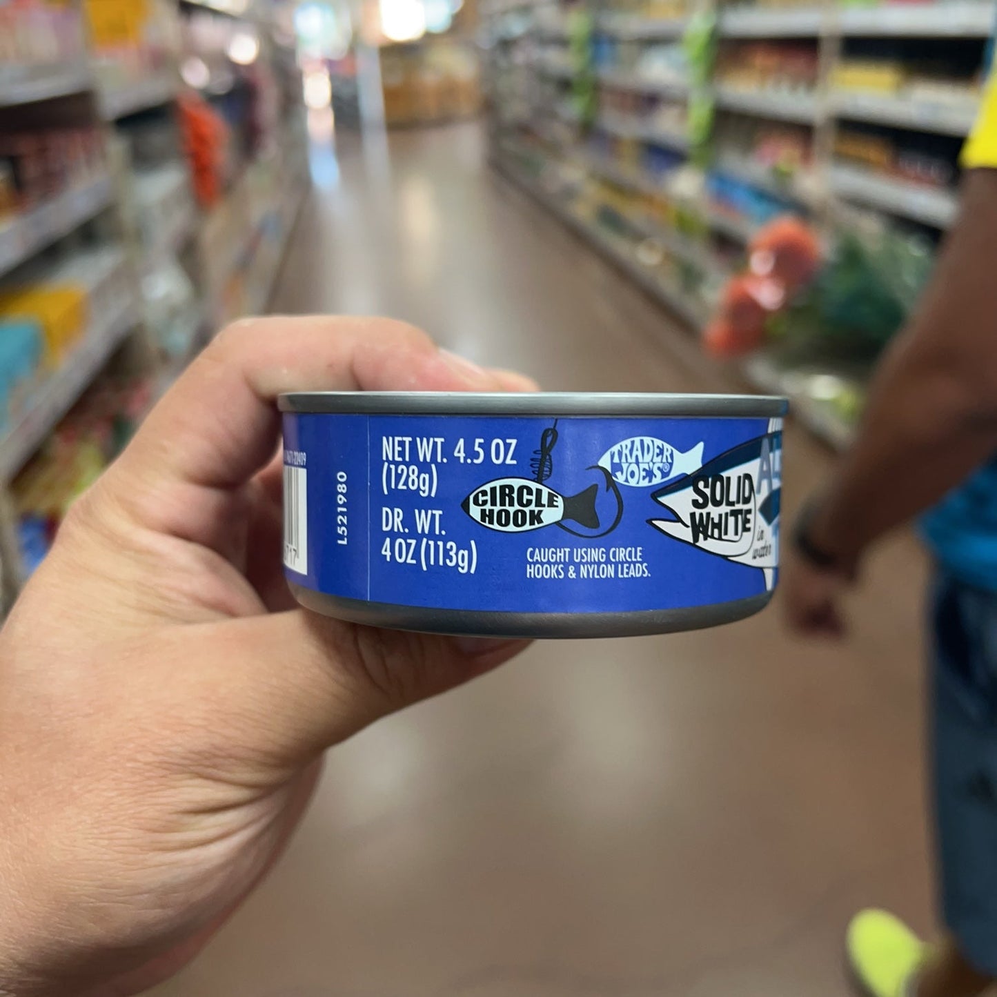 Trader Joe's Sea Salt Added Albacore Tuna showing net weight 4.5 oz and drained weight 4 oz
