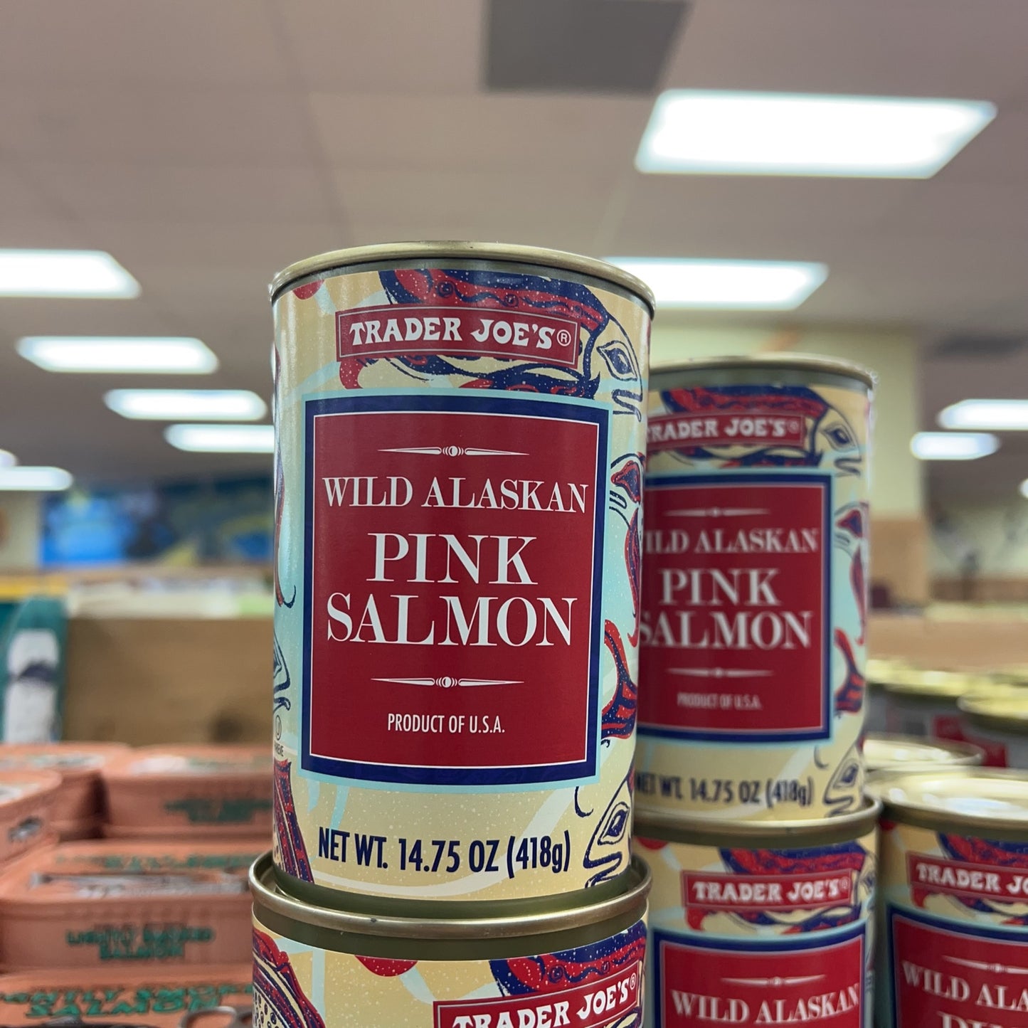 Trader Joe's Wild Alaskan Pink Salmon cans displayed in store